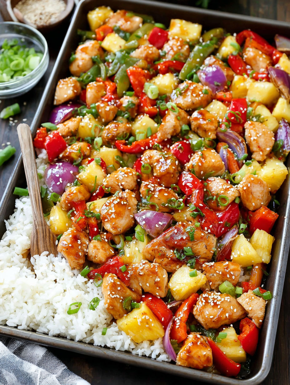A dish of chicken with rice and vegetables.