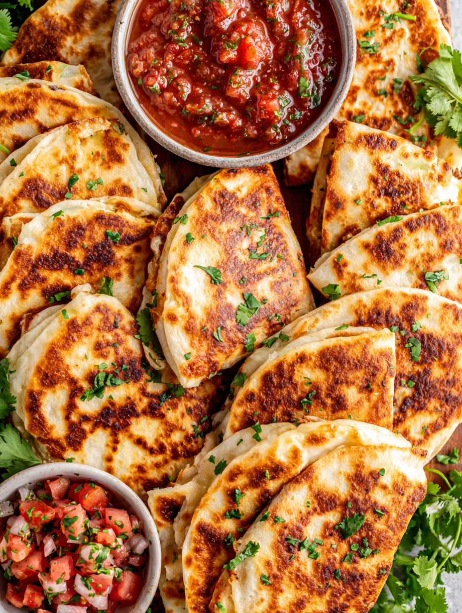 A plate of food with a bowl of salsa.
