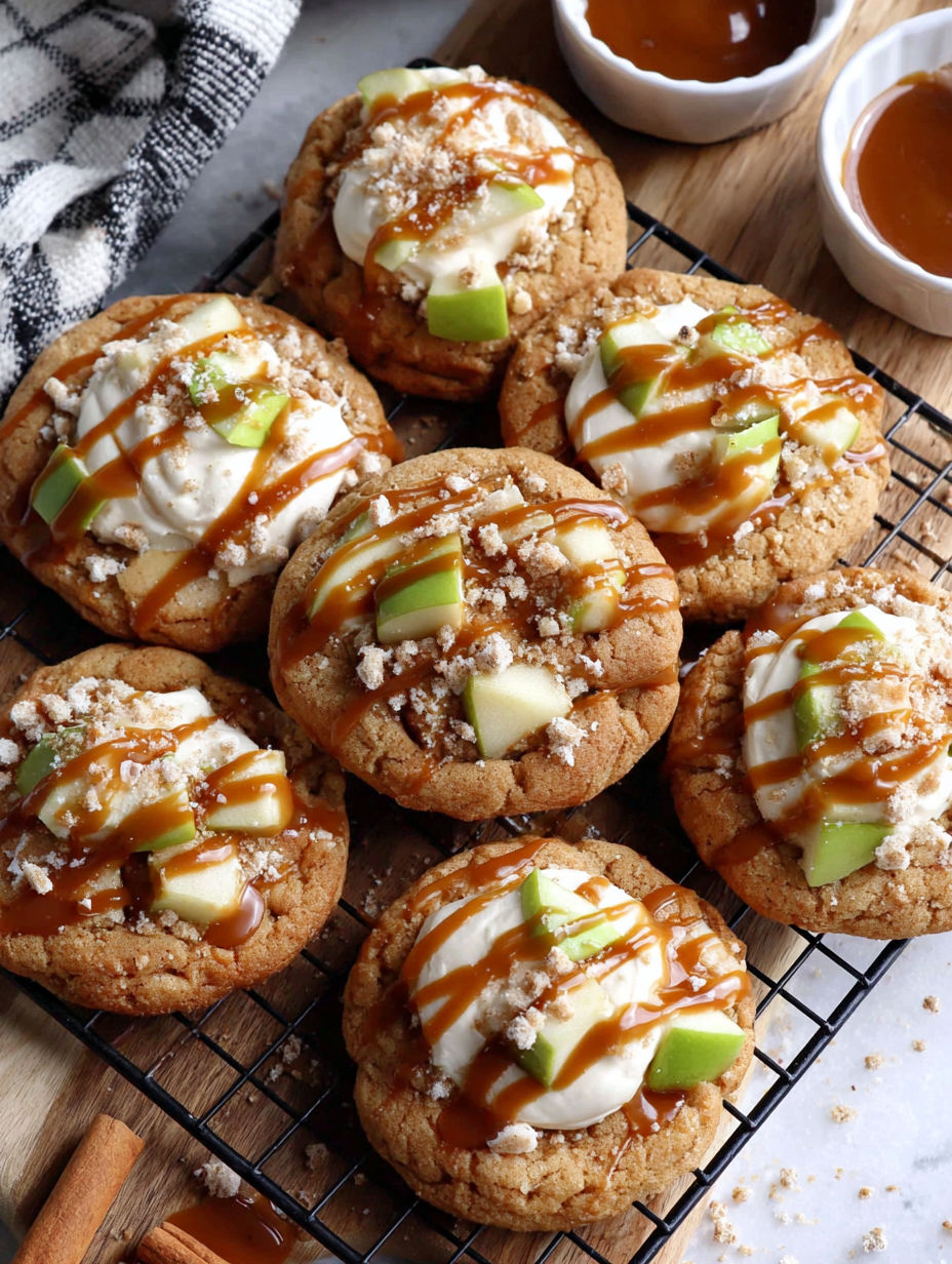 A tray of cookies with caramel drizzled on top.