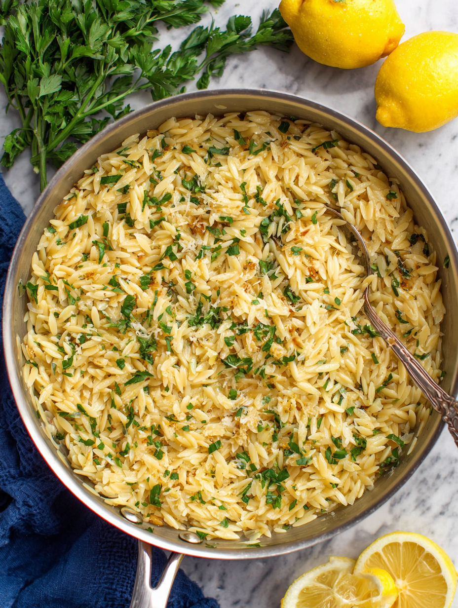 A pan of rice with lemon and garlic.
