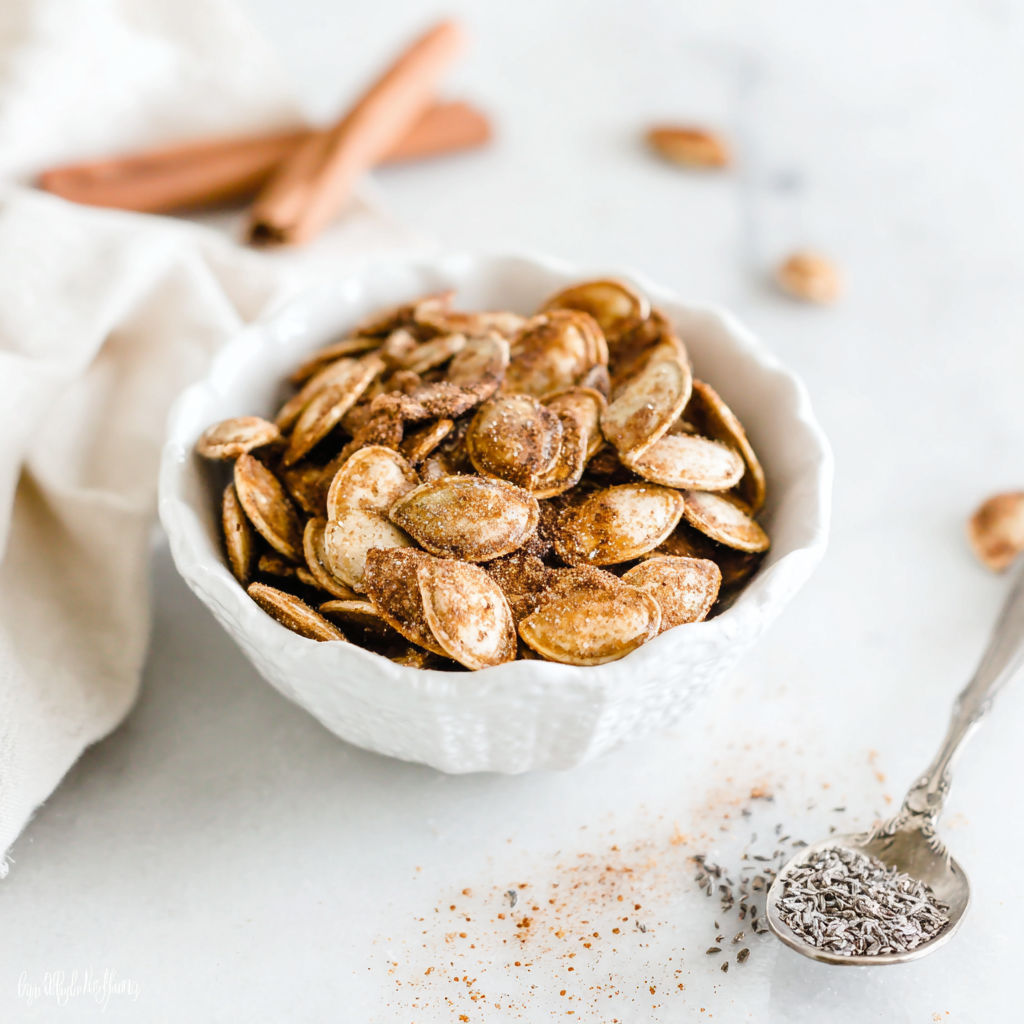 A bowl of pumpkin seeds.