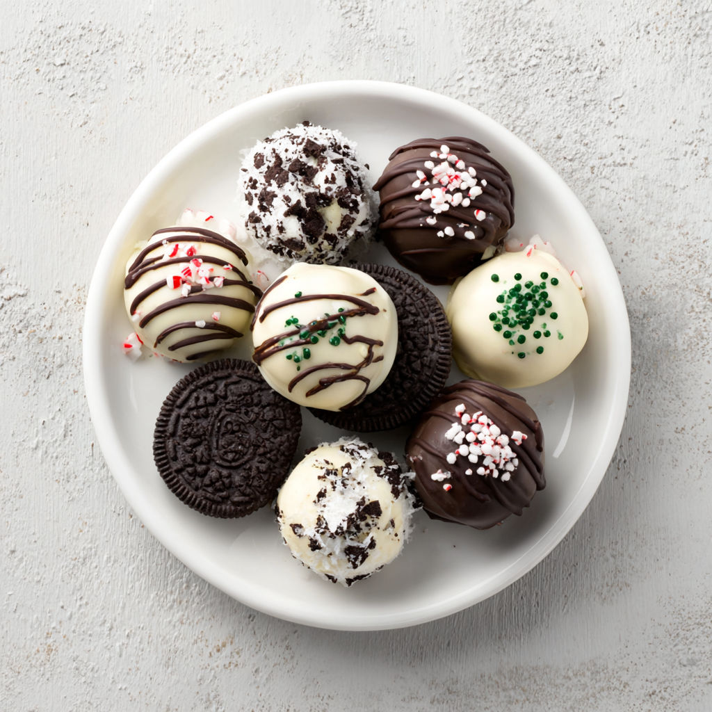 A plate of Christmas Oreo Truffles.