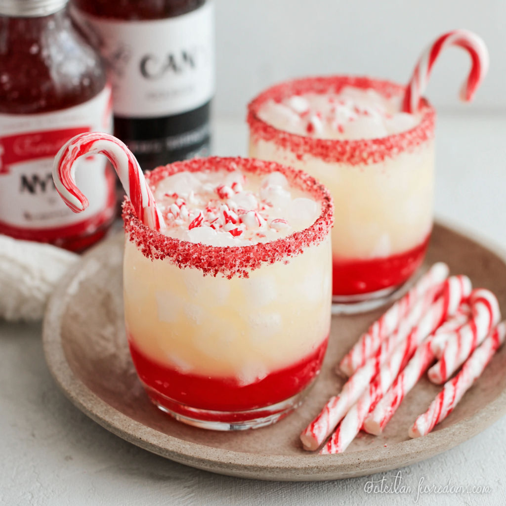 Two glasses of North Pole Cream Soda.