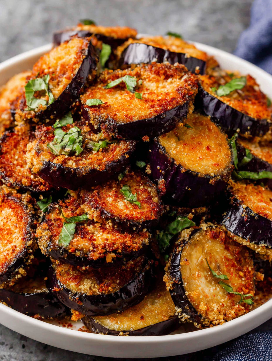 A bowl of crispy air fryer eggplant.