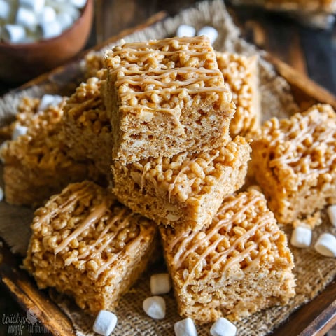 A plate of peanut butter rice krispie treats.