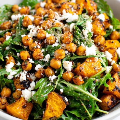A bowl of roasted pumpkin chickpea salad.