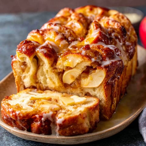 A slice of apple pie pull apart bread.